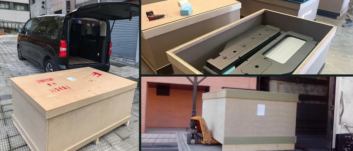 La caja de madera con la que viaja el kit, abierta con el kit calzado y cargada en el camion